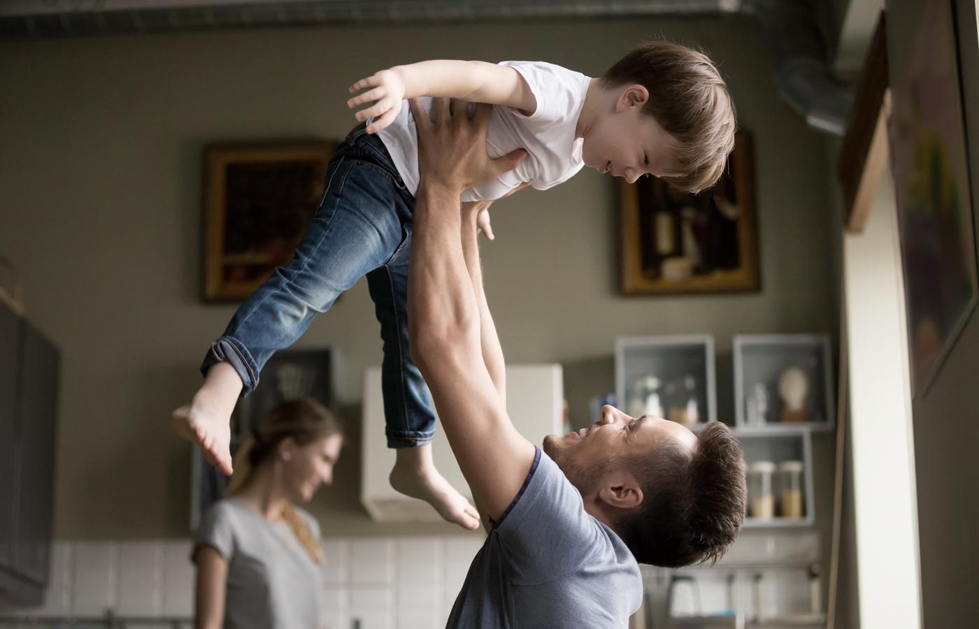 dad holding kid 